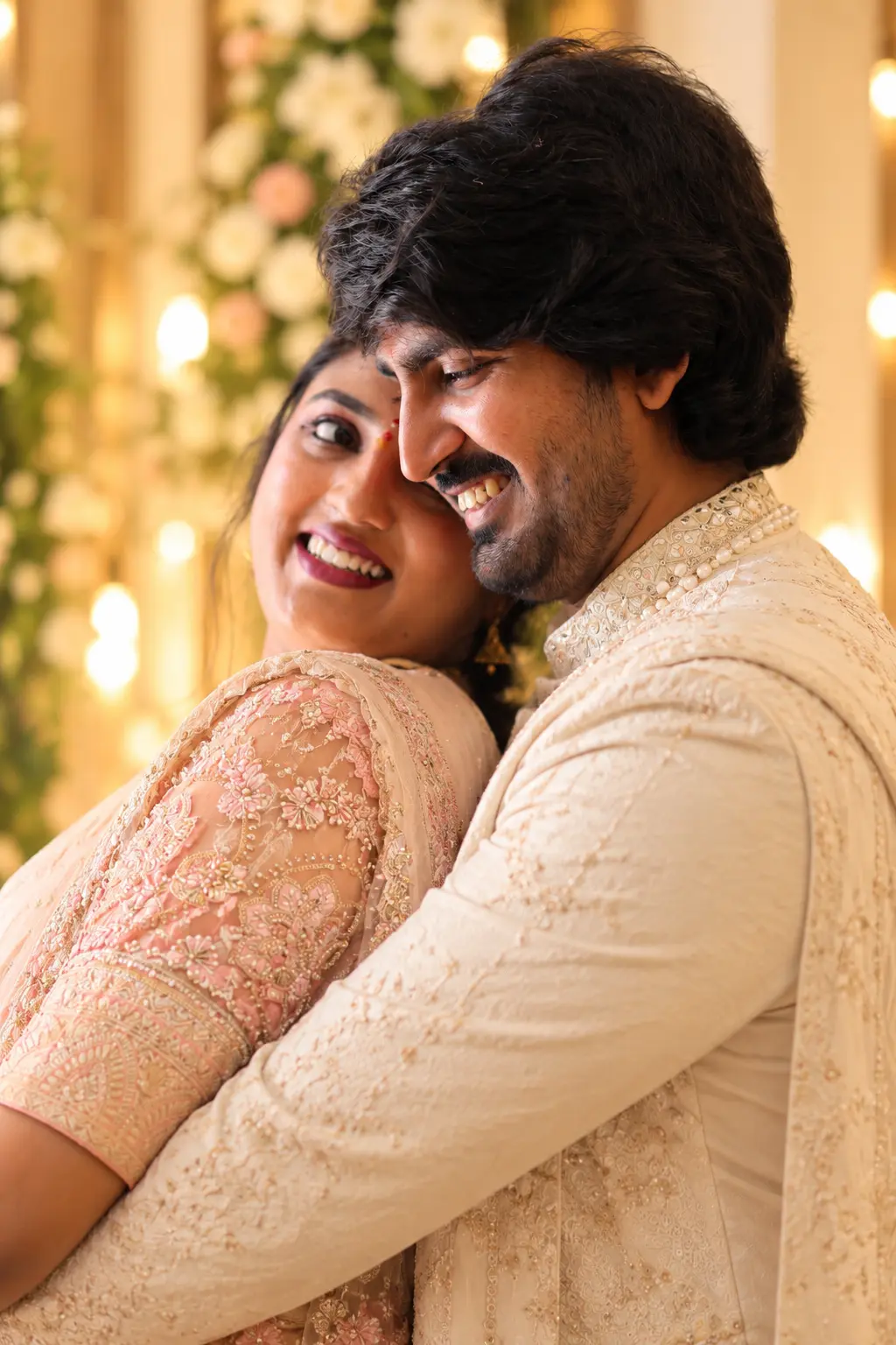Charitha and Anvesh embracing